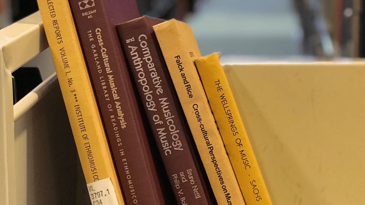 Decorative image of books on a shelf